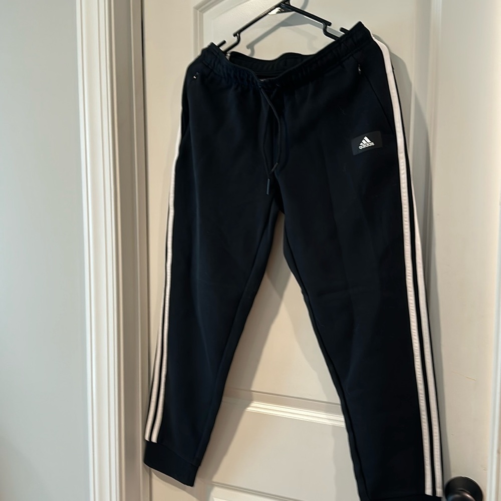 Adidas black sweatpants.